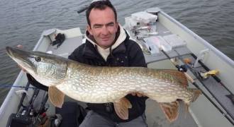 Pike fishing by boat in Lozere