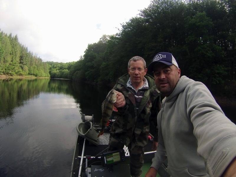 Lure fishing by boat on dam lakes from Correze
